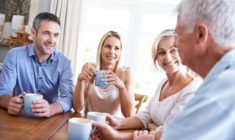 Shot of a young couple talking with their parents over coffee at homehttp://195.154.178.81/DATA/istock_collage/0/shoots/784407.jpg